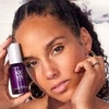 Alicia Keys Holding Facial Serum